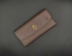 Myosotis flower leather clutch. - The Premium Skin